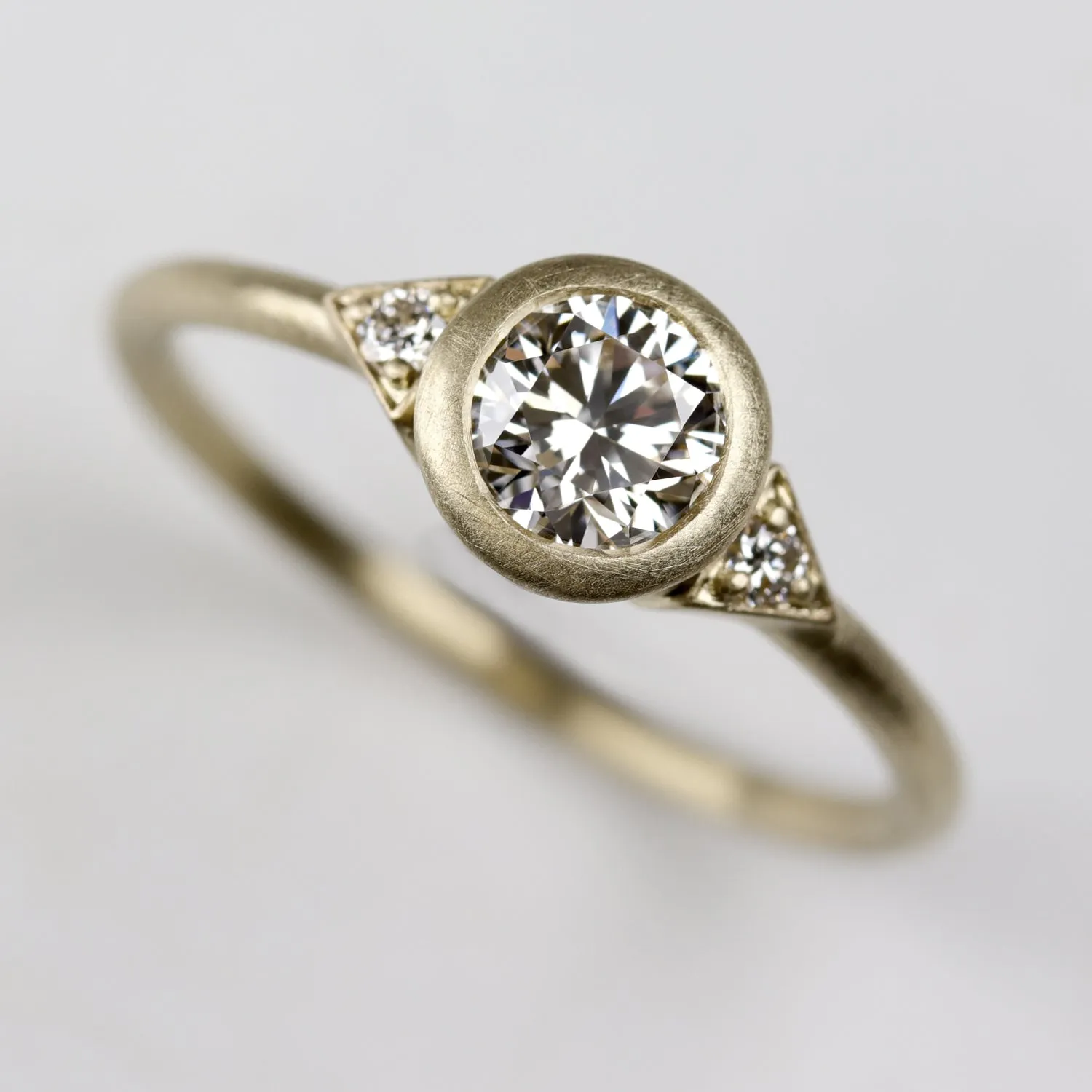 Deco Bezel Three Stone Ring with Diamond Foundry Stone