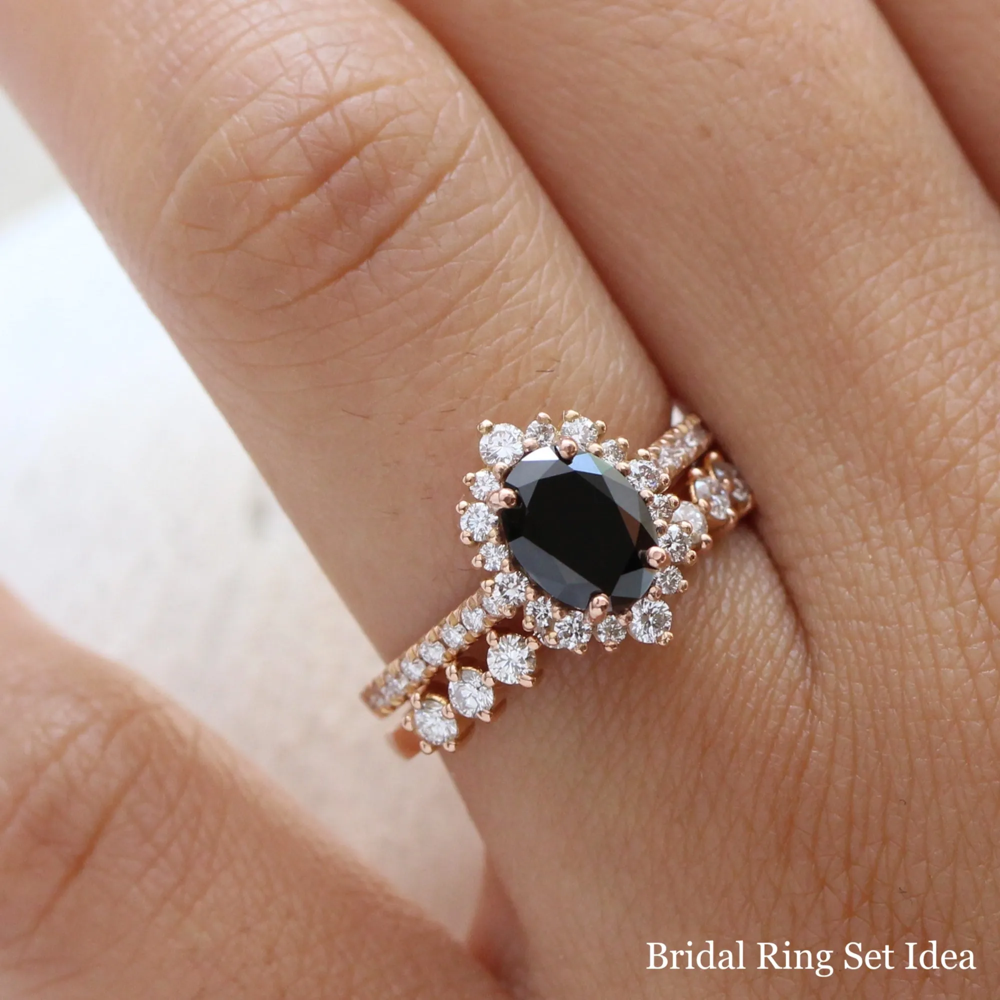 Oval Black Diamond Engagement Ring in Tiara Halo Diamond Pave Band