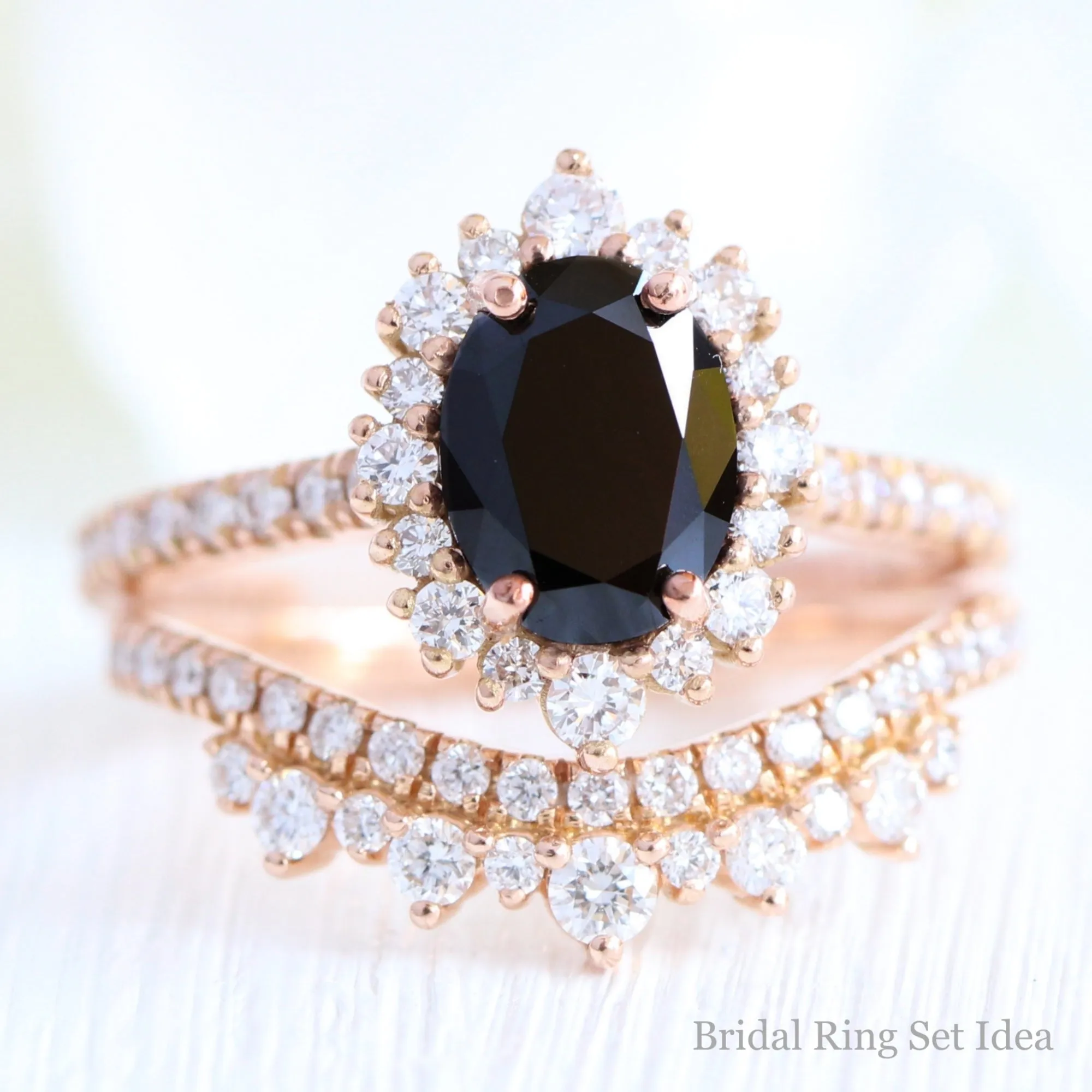 Oval Black Diamond Engagement Ring in Tiara Halo Diamond Pave Band