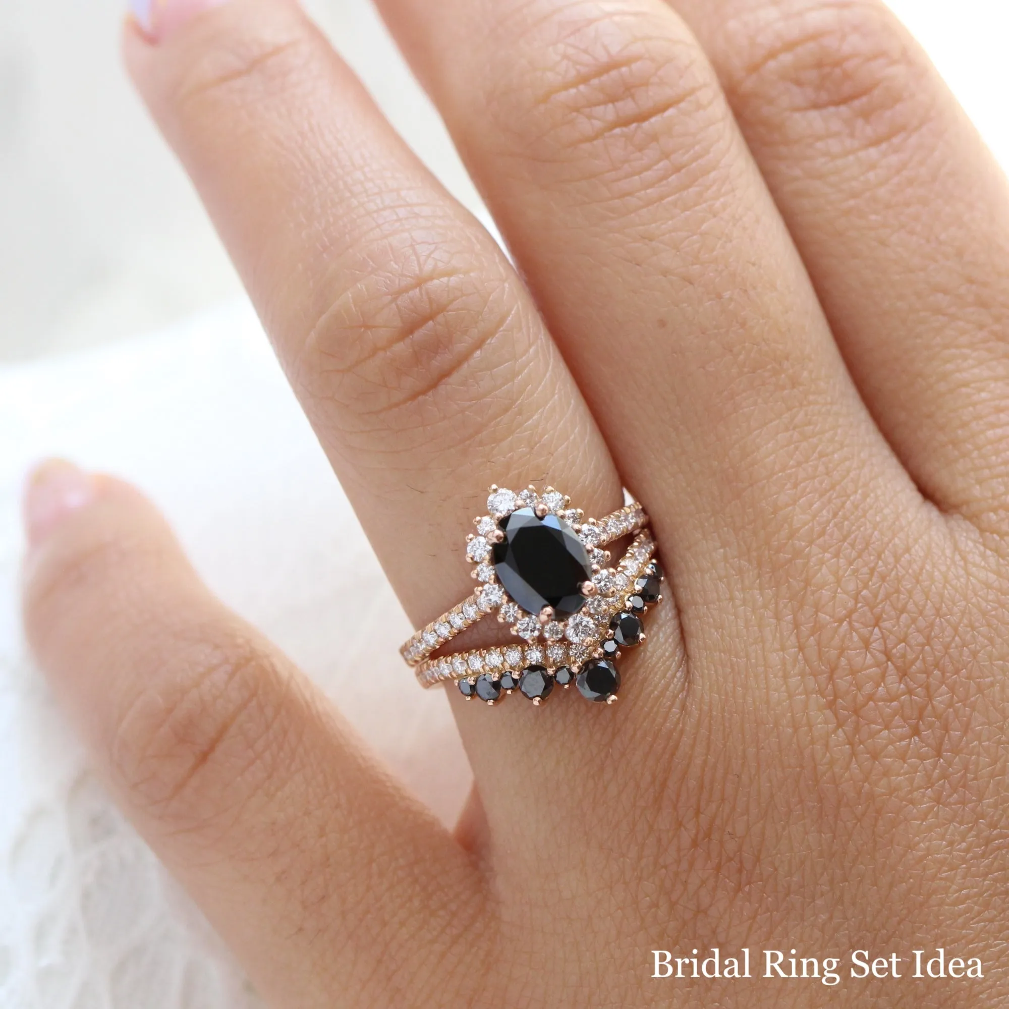 Oval Black Diamond Engagement Ring in Tiara Halo Diamond Pave Band