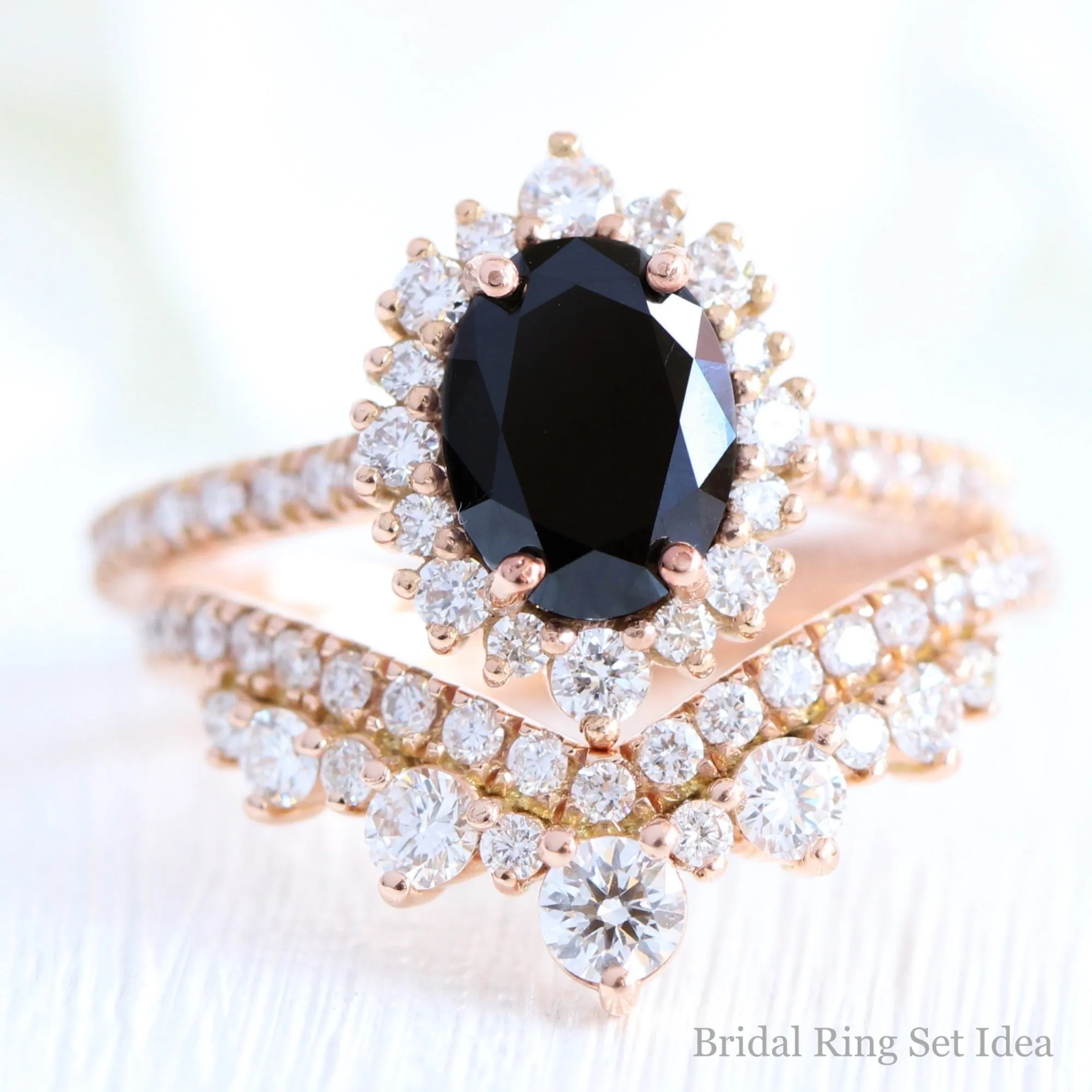 Oval Black Diamond Engagement Ring in Tiara Halo Diamond Pave Band