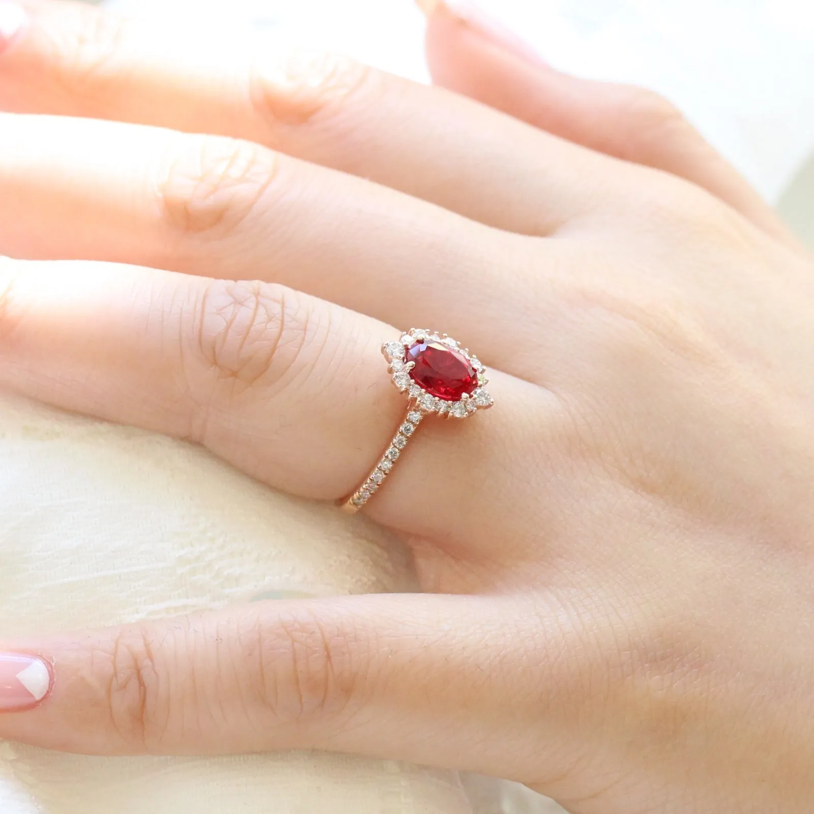 Oval Ruby Engagement Ring in Tiara Halo Diamond Pave Band
