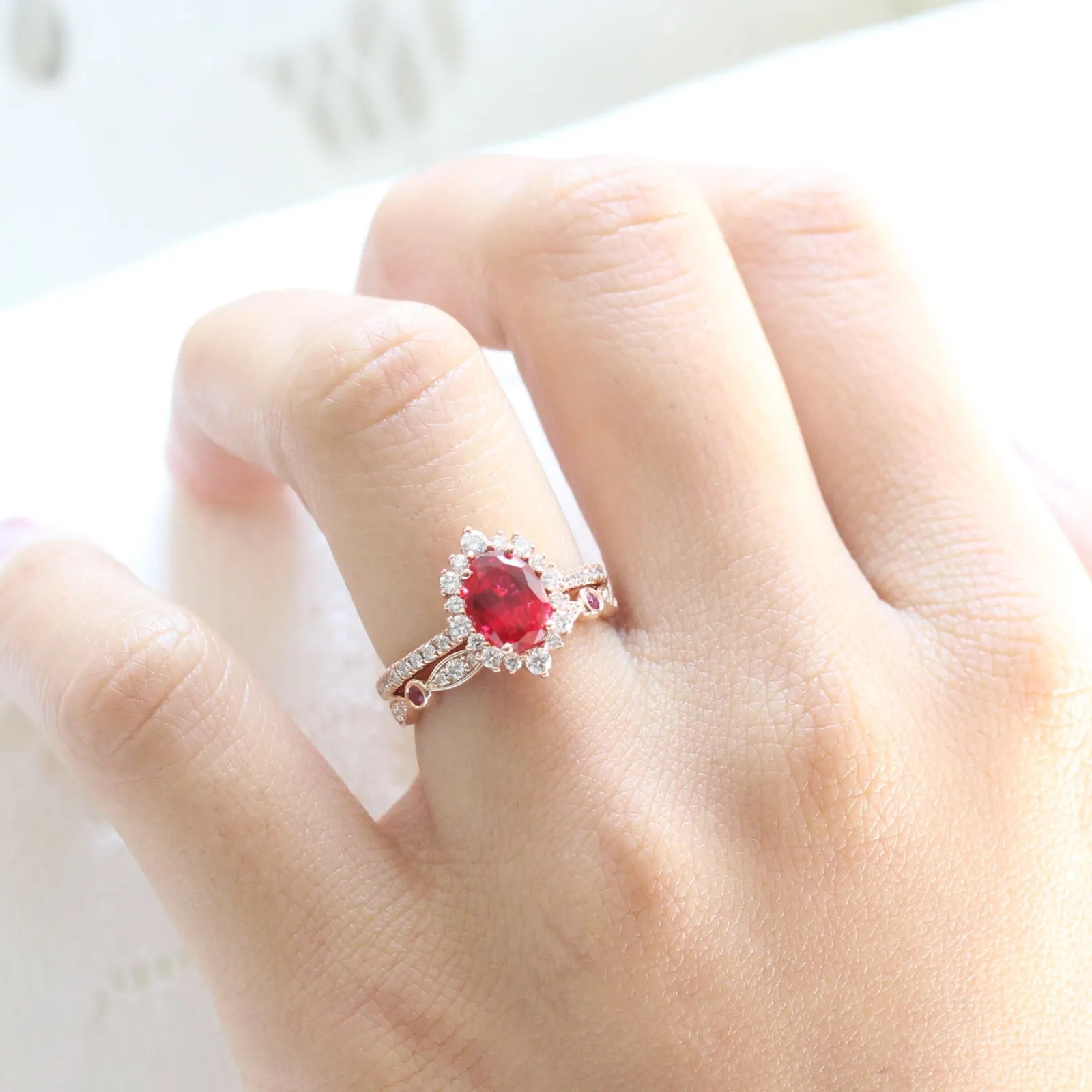 Oval Ruby Engagement Ring in Tiara Halo Diamond Pave Band