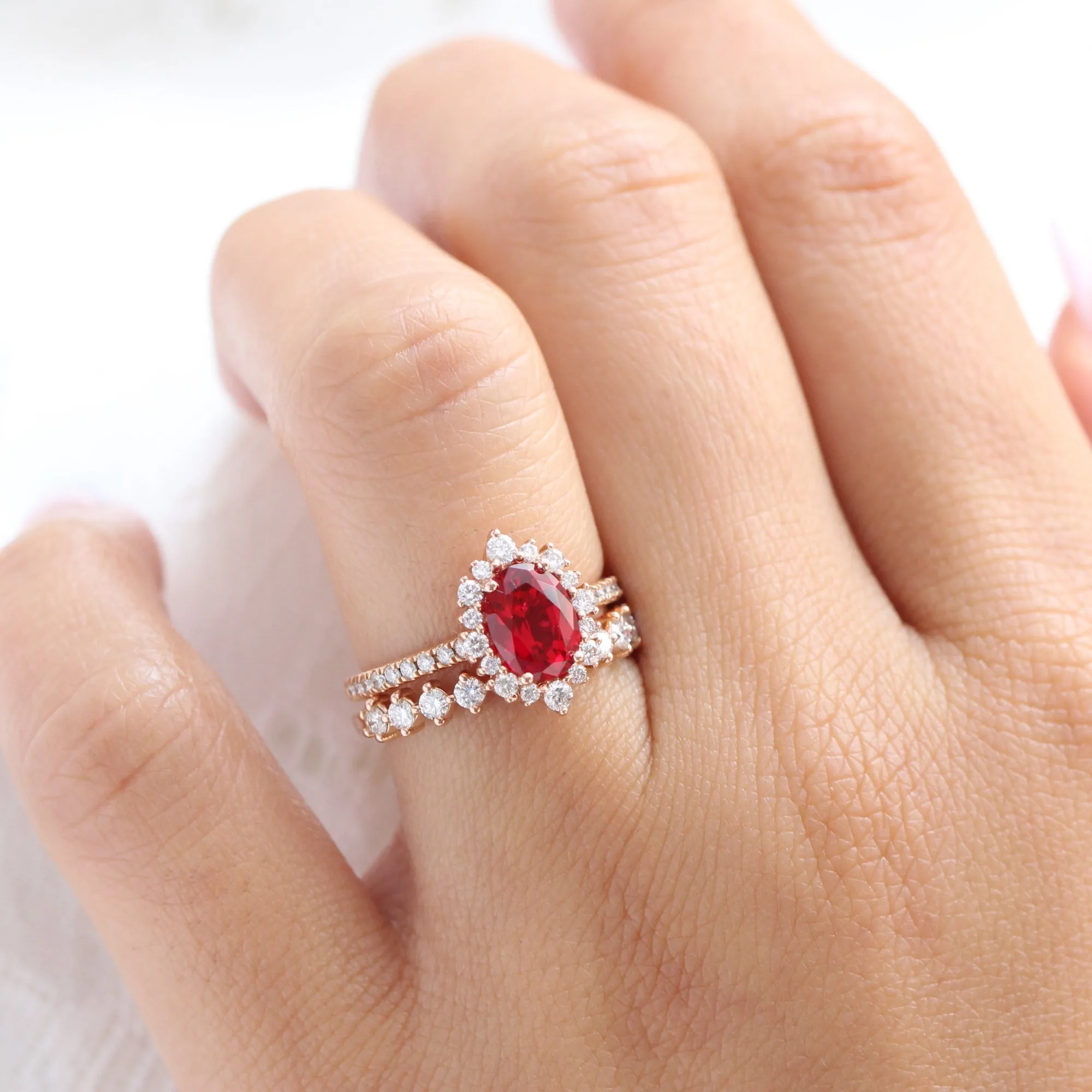 Oval Ruby Engagement Ring in Tiara Halo Diamond Pave Band