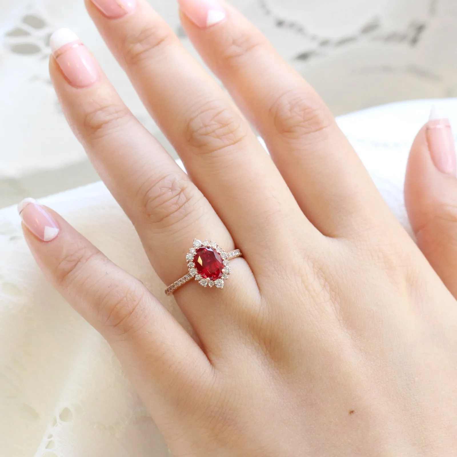Oval Ruby Engagement Ring in Tiara Halo Diamond Pave Band