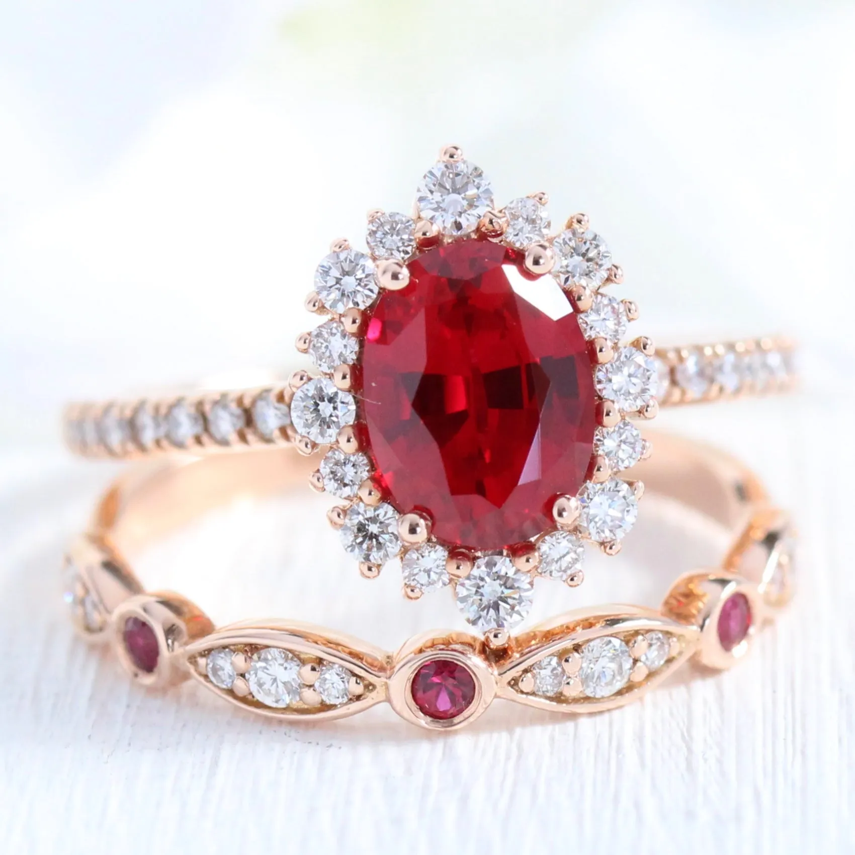 Oval Ruby Engagement Ring in Tiara Halo Diamond Pave Band