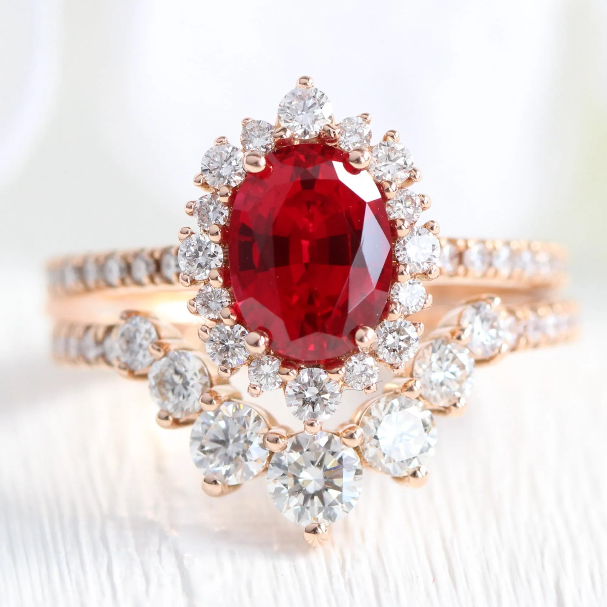 Oval Ruby Engagement Ring in Tiara Halo Diamond Pave Band