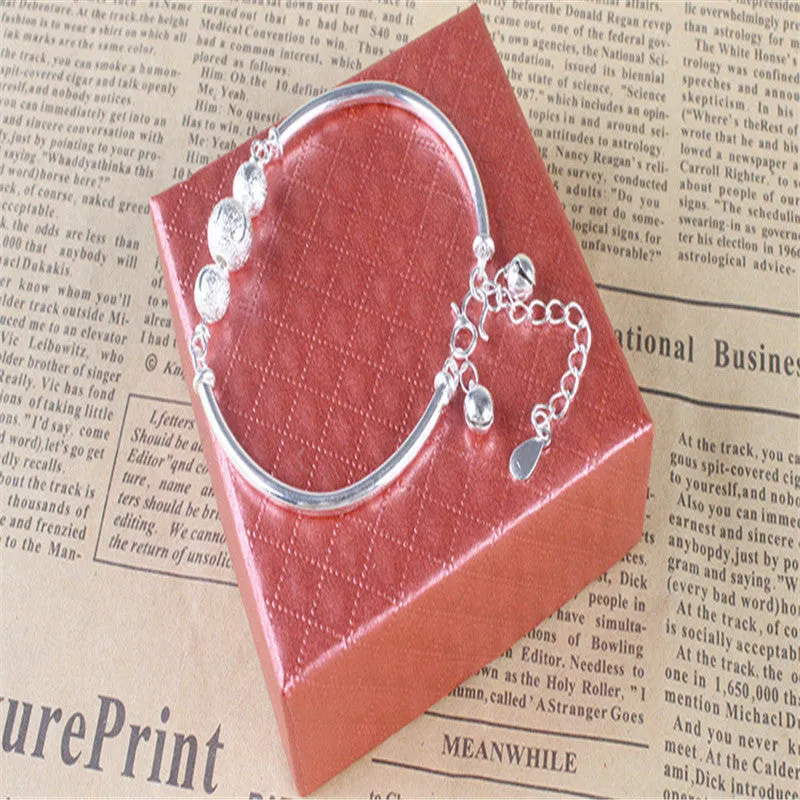 Turning Beads and Bells Silver Plated Bracelet