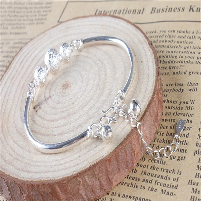 Turning Beads and Bells Silver Plated Bracelet