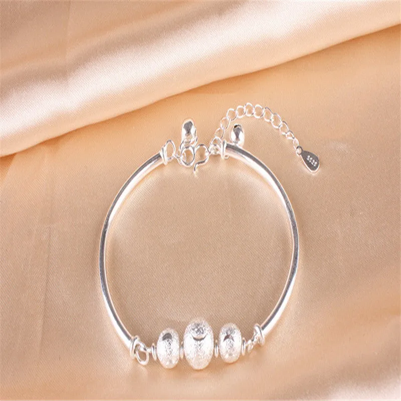 Turning Beads and Bells Silver Plated Bracelet